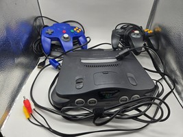 Nintendo 64 console and accessories - £76.54 GBP