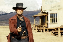 Pale Rider Clint Eastwood drawing gun in western town classic 24x36 inch Poster - £23.73 GBP