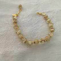 Murano glass cream/gold beaded bracelet  - $45.00