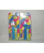 2X PEZ Dispenser, Blue Garfield &amp; Smurf With Japanese Card &amp; Sealed In P... - $317.45 MXN