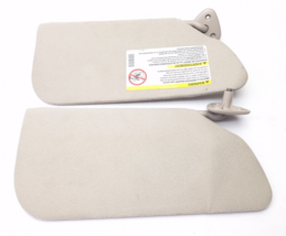 1995-2005 Chevrolet Cavalier Sunfire Sun Visor Pair Set Left Right - $57.76