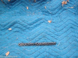 1983 1984 1985 GRAND MARQUIS ADHESIVE MOUNT SIDE EMBLEM OEM USED ORIG ME... - $49.65