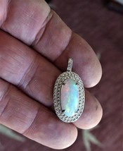 Opal Pendant with 7.6cwt Opal. Independent Master Valued $1,380 - £556.34 GBP