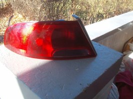 DODGE STRATUS LEFT TAILLIGHT OEM USED 2002 2004 2006 OEM ORIGINAL CHRYSL... - $125.38