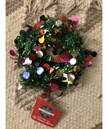2D Tinsel Decor - $174.37 MXN