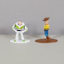 Nano Metalfigs Disney Pixar Woody and BuzzLighter Toy Story Die Cast Lot Of 2 - $10.88