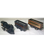 Vintage Cast Iron Wind Up Train Locomotive Engine A.F. 12 with 2 passeng... - $1,503.06 MXN