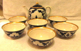 Pahkta Porcelain Asian Cloud Floral 7 Piece Tea Set with Cups and Pitcher  - $197.01