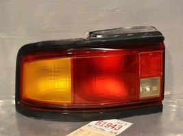 1990-1991 Mazda Protege Left Oem tail light 43 4D3 - $18.49