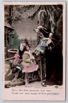 Father Christmas RPPC St Nicholas Gives Girl Baby Doll Postcard U26 - £16.14 GBP