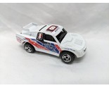 Vintage 1971 White Ford Bad Mudder Bousquette Toy Car 3&quot; - £24.81 GBP