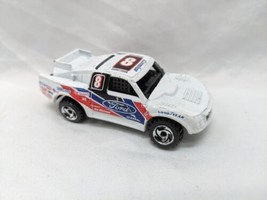 Vintage 1971 White Ford Bad Mudder Bousquette Toy Car 3&quot; - £24.80 GBP