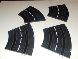ARTIN  1/43RD SLOT CAR ACCESSORY-- FOUR CURVE TRACK SECTIONS - GOOD- W44D - $4.45