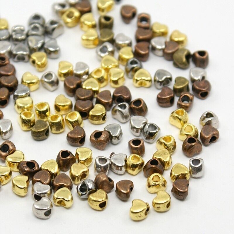 Tiny Heart Spacer Beads Assorted Lot Antiqued Bronze Gold Silver 4mm Fin... - $5.45