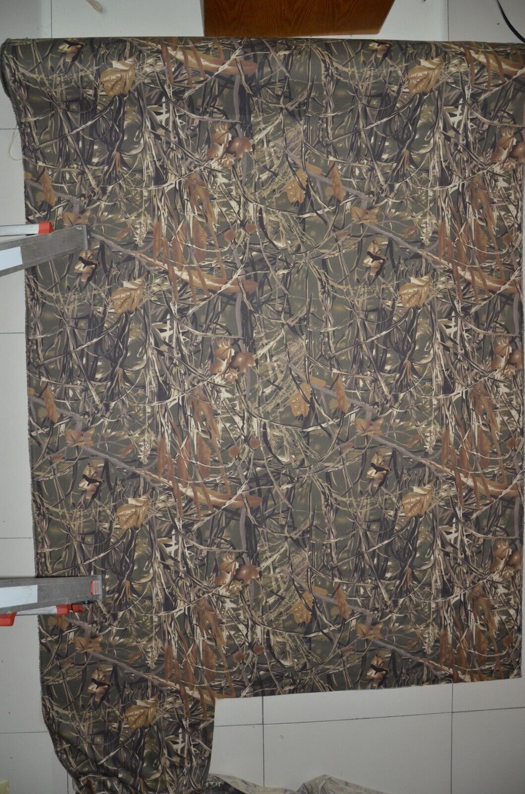 Camouflage wetlands design material, 57 inches wide and 65 inches long. - $7.24+