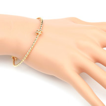 Gold Tone Twisted Bangle Bracelet With Trendy Knot Design - £19.23 GBP
