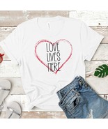LOVE LIVES HERE wrapped in a Heart Graphic T-Shirt - $24.88