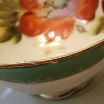 VINTAGE OCCUPIED JAPAN MERIT CHINA FOOTED TEACUP AND SAUCER image 2