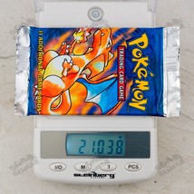 21.038 HEAVY Charizard Pokemon Base Set Booster Pack TCG 4th print UK 20... - $770.93