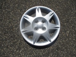 One factory 2002 to 2004 Kia Spectra 14 inch bolt on hubcap wheel cover - $18.50