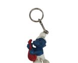 VINTAGE 1980&#39;s PEYO SMURFS KEYCHAIN SMURF W/ RED GUITAR HONG KONG - $19.00