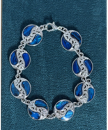 Handcrafted Bracelet, Faux Abalone Blue swirl  beads w/silvertone accents - $10.89