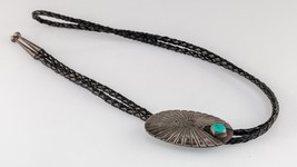 Sterling Silver Sunburst Bolo Tie with Turquoise Accent Braided Leather - $594.00