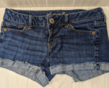 American Eagle Women 4 blue jean low-rise cutoff shorts  3&quot; inseam - $9.89