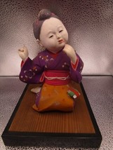 Vintage Hakata Urasaki sewing girl Clay Figurine 9 x 9 x 6&quot; in ratan base - £23.36 GBP