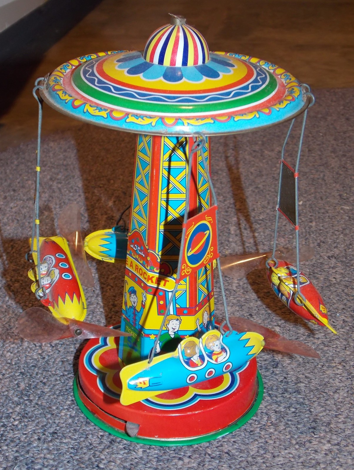 Schylling Rocket Ride Carousel Tin Toy 1970Now