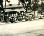 Antique Firetruck Driving Down Street Black and White Photo - $17.80