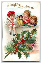 A Bright Christmas Children Playing With Doll Holly Embossed DB Postcard R10 - £4.65 GBP