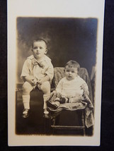 Vintage PHOTO POST CARD 5.5”x3.5” 2 Young Boys on Chair Bench large Bow Tie - £5.09 GBP