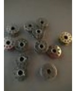 12 Metal Sewing Machine Bobbins - $2.60 CAD