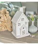 White Ceramic Tea light House - $815.11 MXN