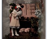 RPPC Little Girls w Pig Studio View Merry Christmas Tinted Photo Postcar... - $5.39