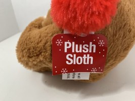 American Greetings  plush round holiday sloth red green blue striped earmuffs  - £10.19 GBP