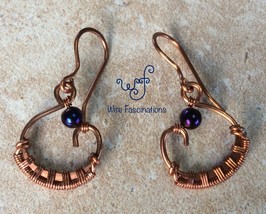 Handmade copper earrings: circular wire weaving with purple hematite - £19.65 GBP