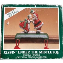 Kissin&#39; Under the Mistletoe Santa &amp; Mrs. Claus Cast Iron Double Stocking... - $19.20