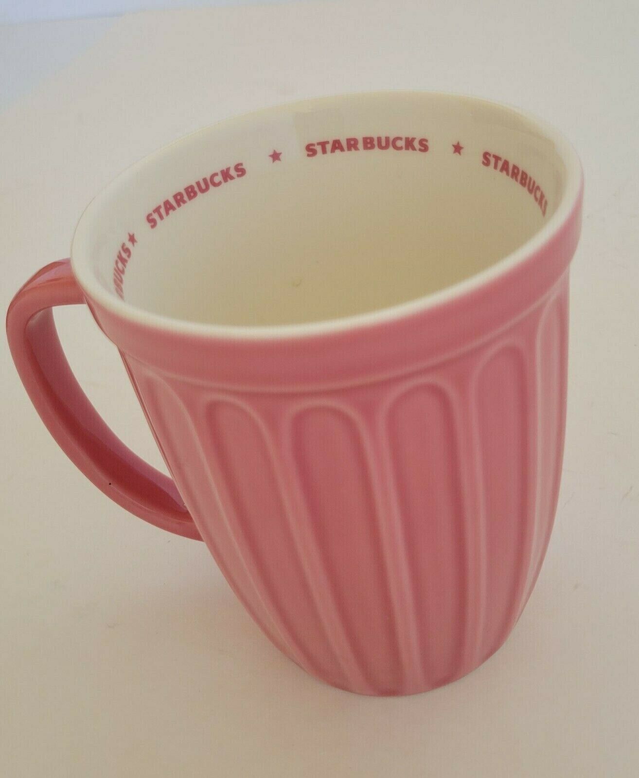 Primary image for Starbucks 2006 16 oz Mug Ribbed Pink  Coffee Cup Ice cream Super Rare
