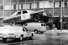 The Blues Brothers 1974 Dodge Monaco Leaps Over Chicago Police car 18x24 Poster - £19.17 GBP