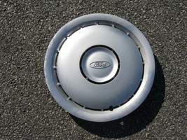 One factory 1986 to 1989 Ford Taurus hubcap wheel cover - $16.66