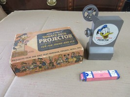Vintage 1950s Walt Disney&#39;s Donald Duck Auto Magic Projector Model No 499 - £102.13 GBP