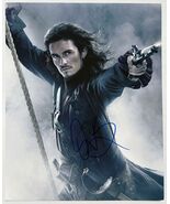 Orlando Bloom Autographed "Pirates of the Caribbean" Glossy 8x10 Photo - $39.00