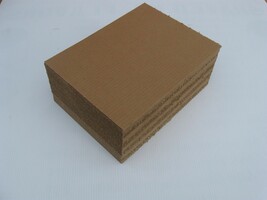 11 x 15 corrugated cardboard Pads (400) - $1,458.76 MXN