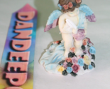 Vintage CWI Angel Figurine With Flowers - $17.81