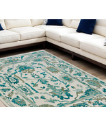 8&#39; X 10&#39; Green and Ivory Wool Floral Hand Knotted Area Rug With Fringe - $2,274.49