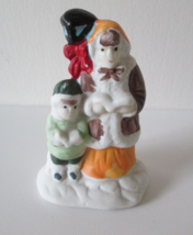 Vintage Porcelain Bisque Christmas Village Figurine, Mother & Child Carolers - $7.92