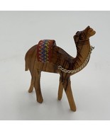 hand carved wooden camel. Red saddle. Chain hanging from neck. - $11.30