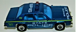 Matchbox 1987 Ford LTD Crown Victoria Blue/Ylw State Police Car 1:69 Scale - $9.00